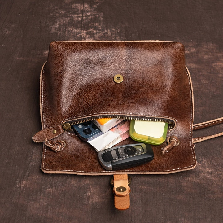 Rosa – Bolso bandolera con hebilla clásica y toque tradicional