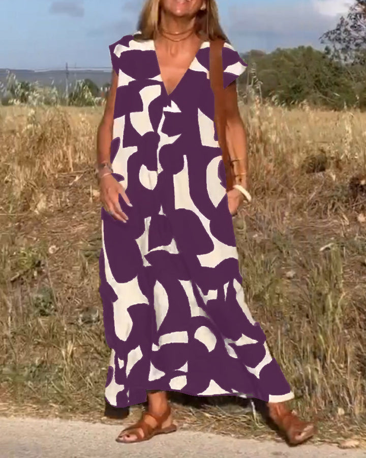 Paula – Vestido elegante con estampado y cuello en V