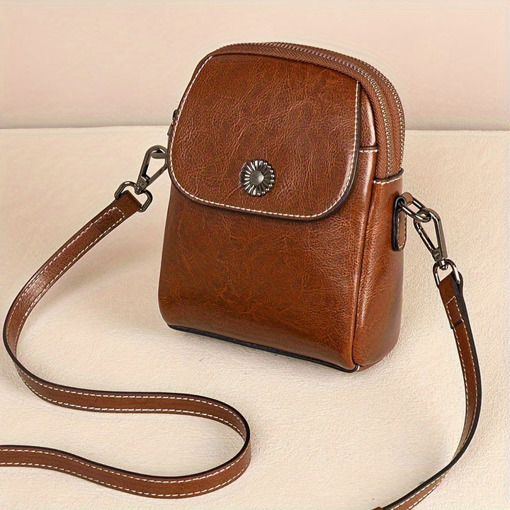 Laura – Bolso bandolera compacto elegante