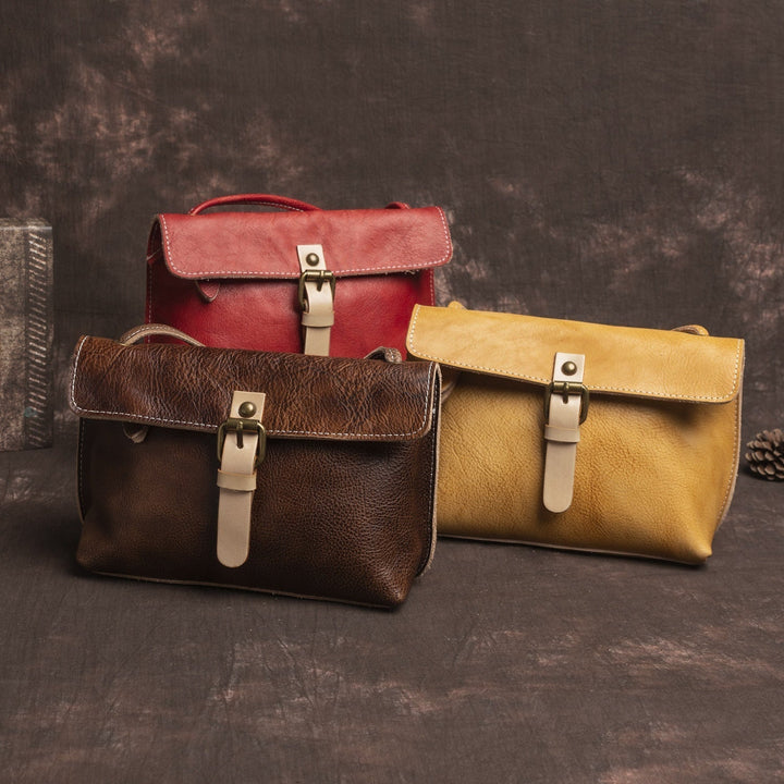 Rosa – Bolso bandolera con hebilla clásica y toque tradicional