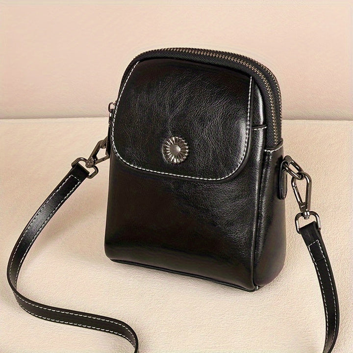 Laura – Bolso bandolera compacto elegante