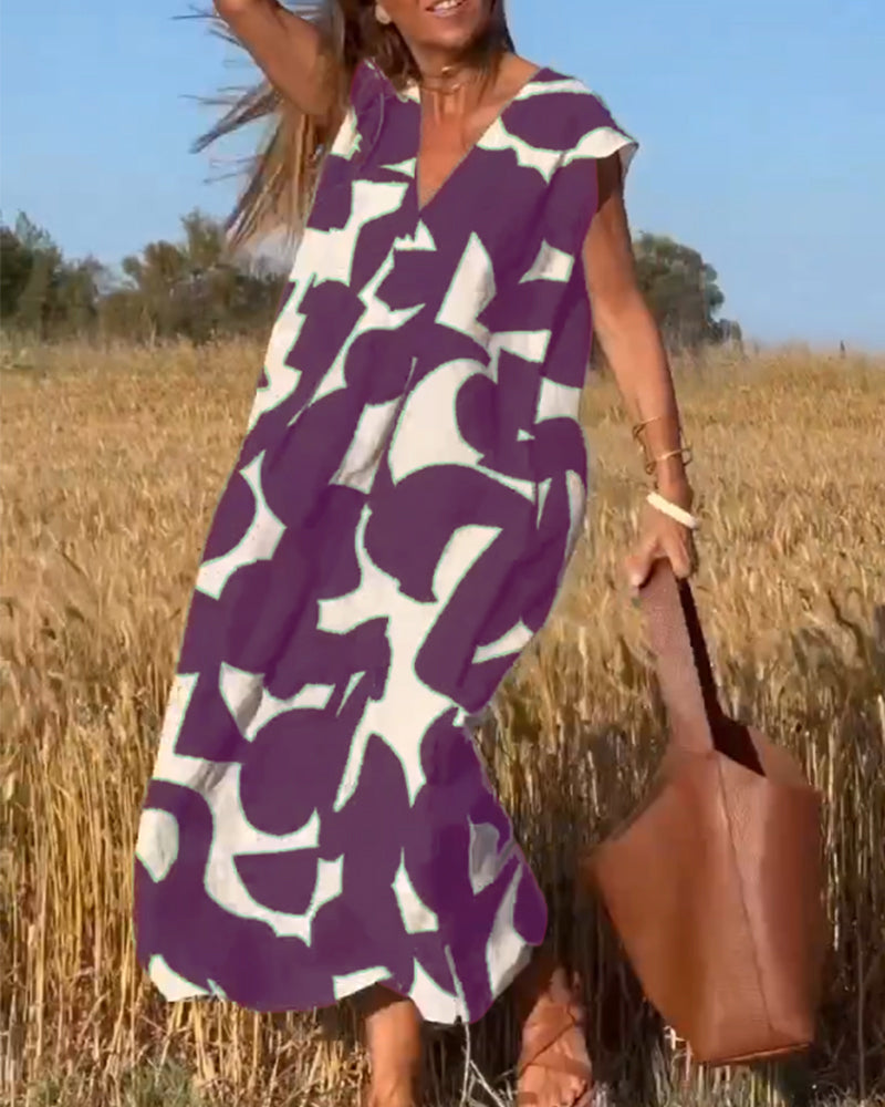 Paula – Vestido elegante con estampado y cuello en V