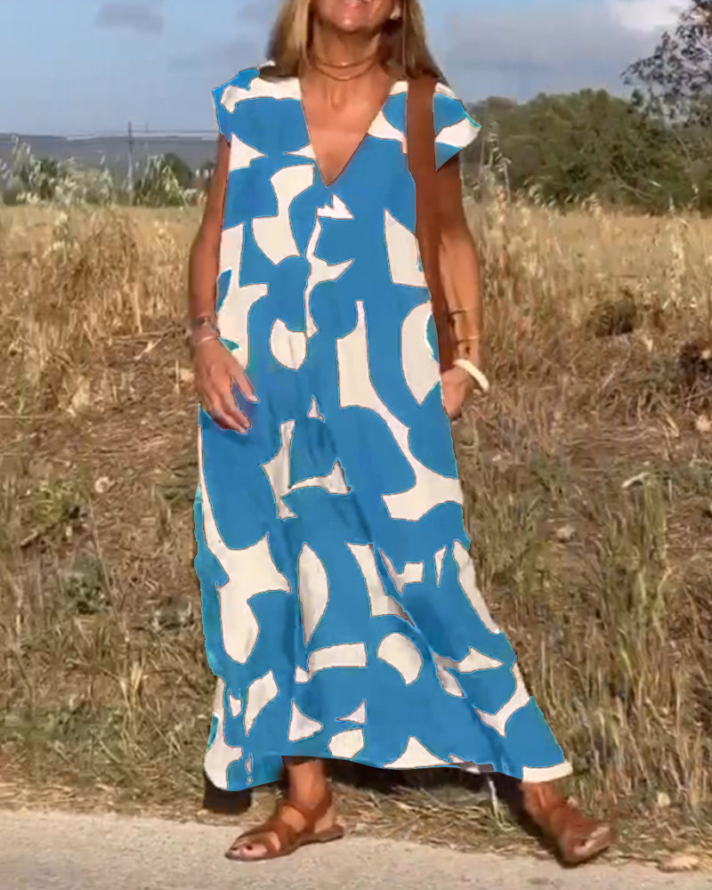 Paula – Vestido elegante con estampado y cuello en V