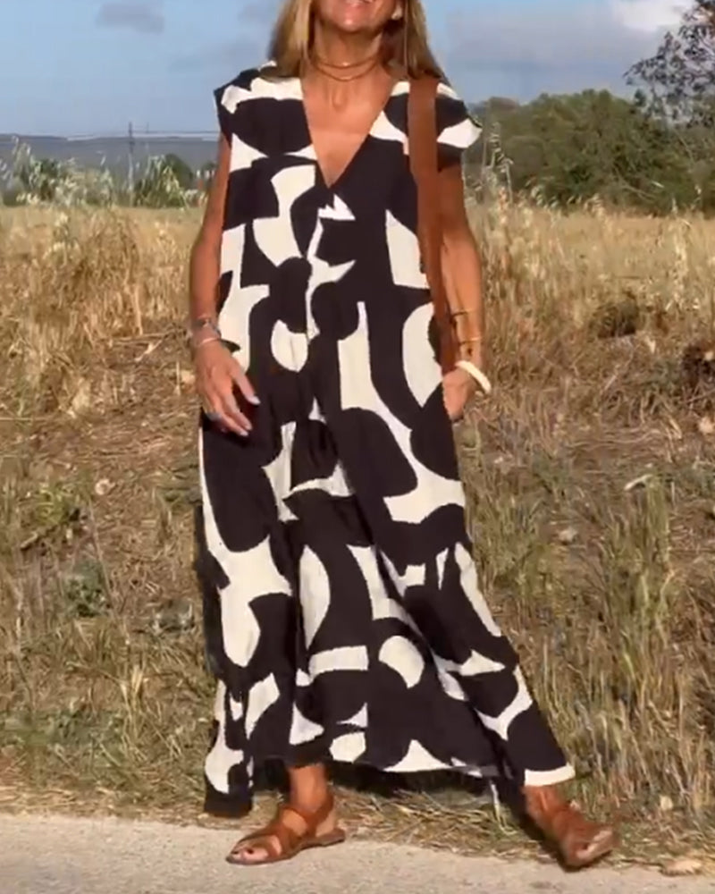 Paula – Vestido elegante con estampado y cuello en V