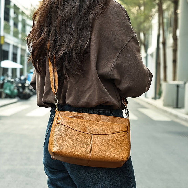Rina – Bolso bandolera elegante con diseño de guijarros