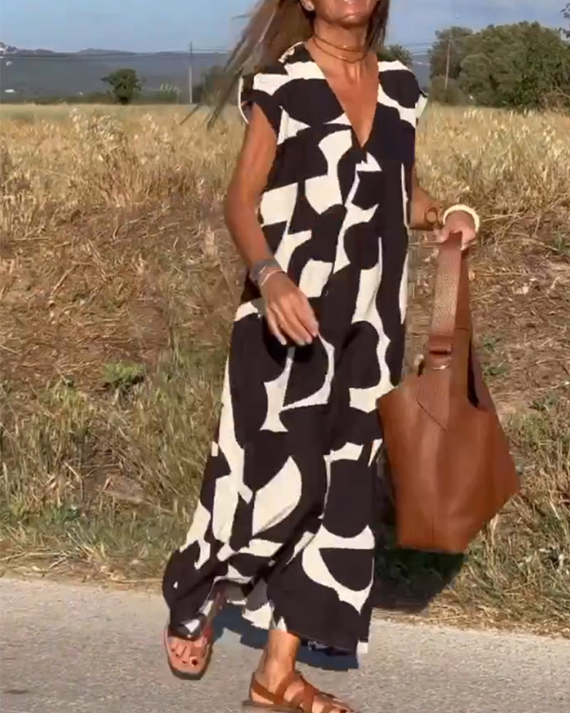 Paula – Vestido elegante con estampado y cuello en V