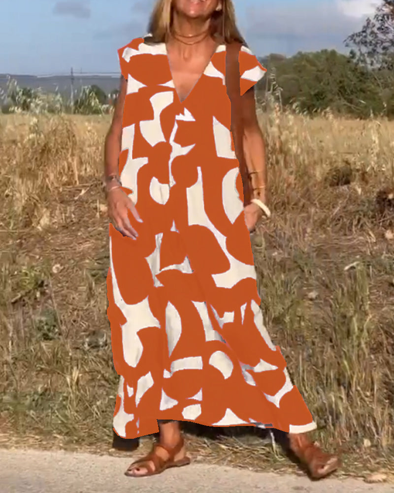 Paula – Vestido elegante con estampado y cuello en V