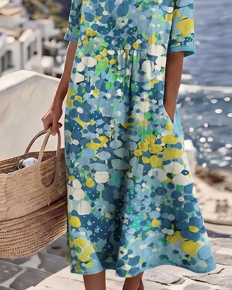 Lucía – Vestido midi floral cuello redondo
