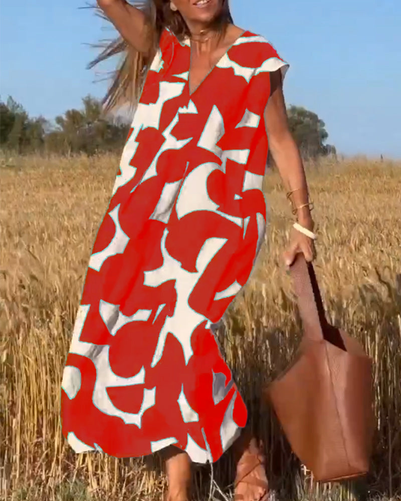 Paula – Vestido elegante con estampado y cuello en V