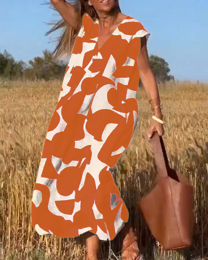 Paula – Vestido elegante con estampado y cuello en V