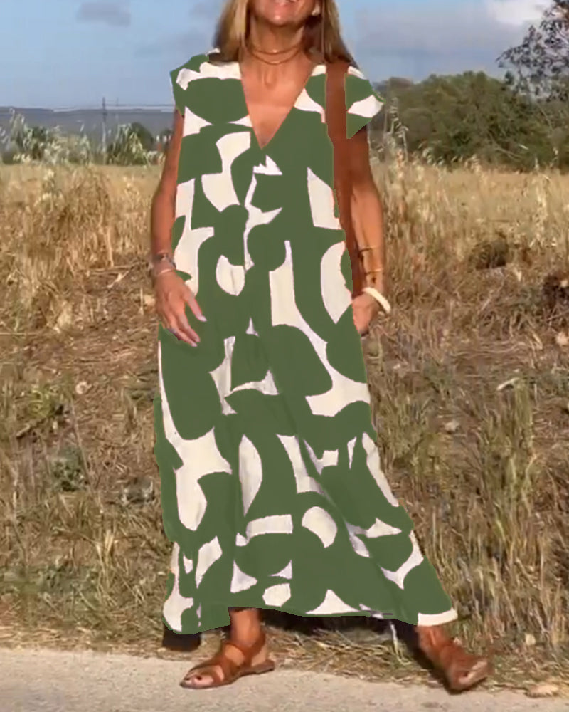 Paula – Vestido elegante con estampado y cuello en V