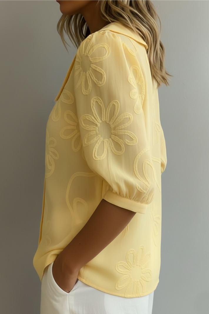 Flora – Blusa cuello redondo con motivo floral