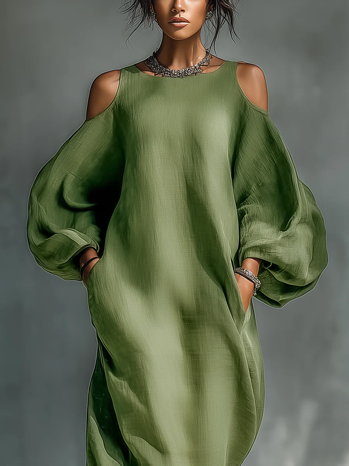 Selena – Vestido largo verde fluido con hombros descubiertos y mangas elegantes