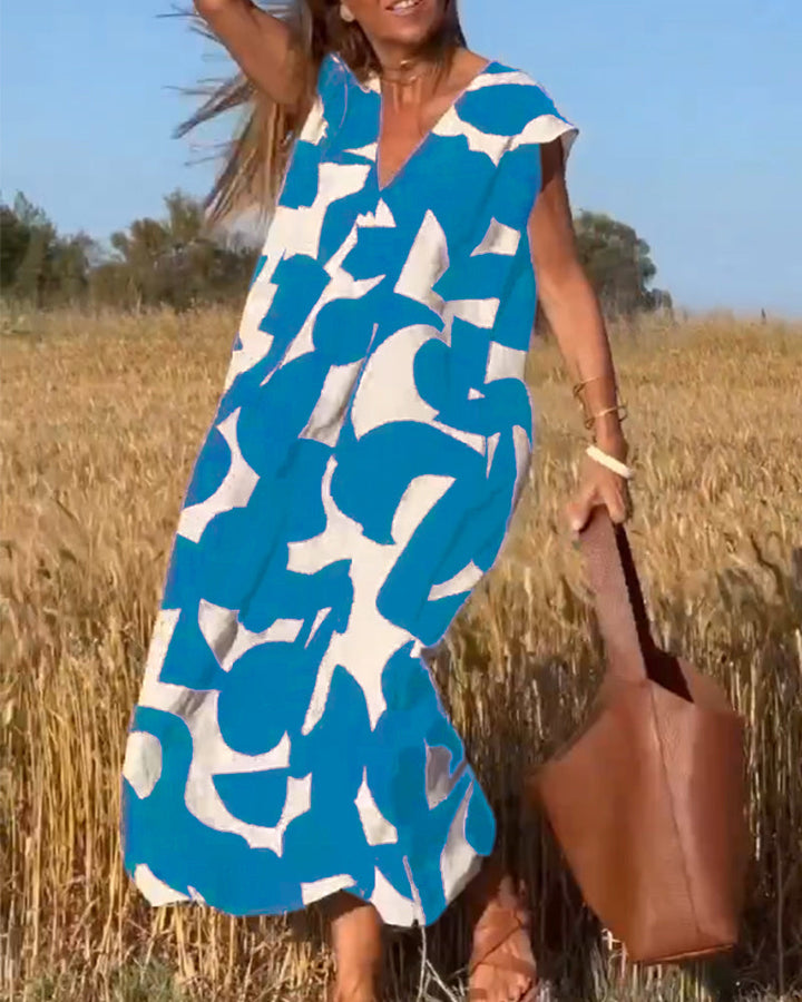Paula – Vestido elegante con estampado y cuello en V