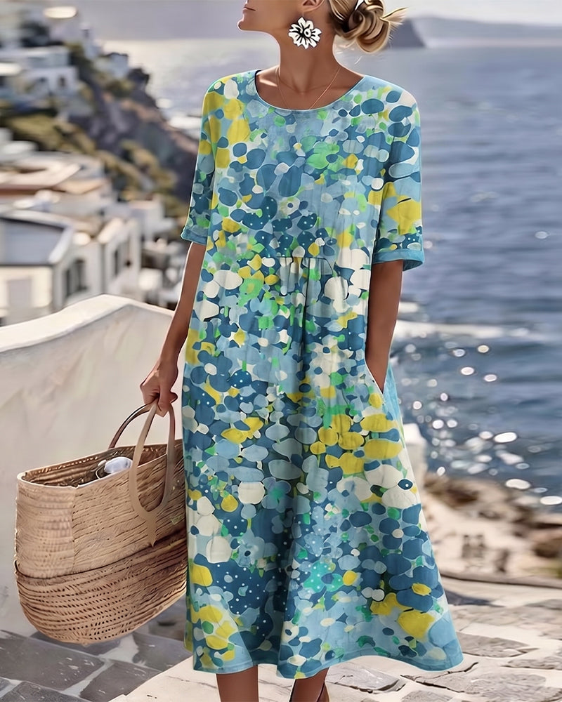 Lucía – Vestido midi floral cuello redondo
