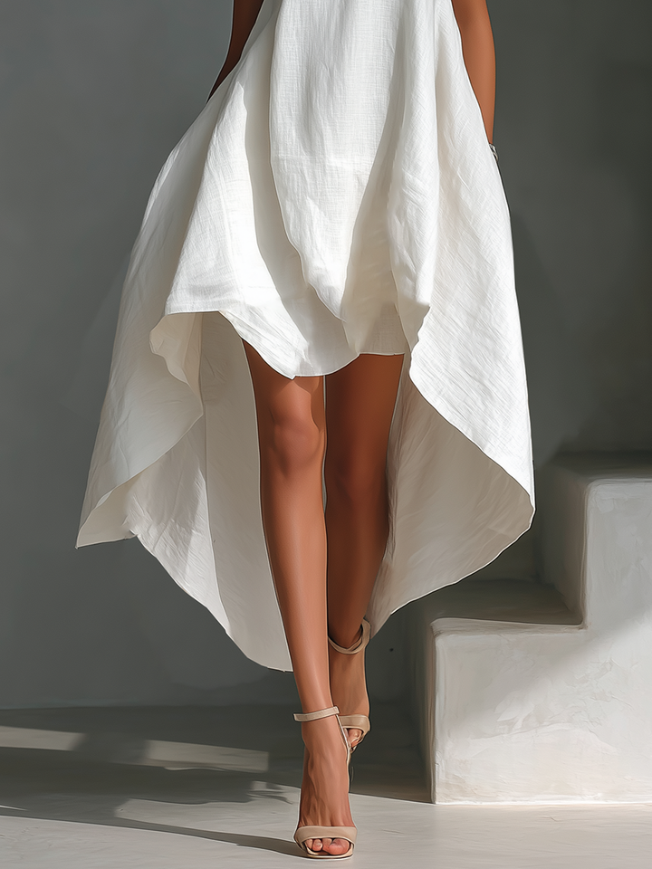 Elena – Vestido midi blanco con corte asimétrico elegante