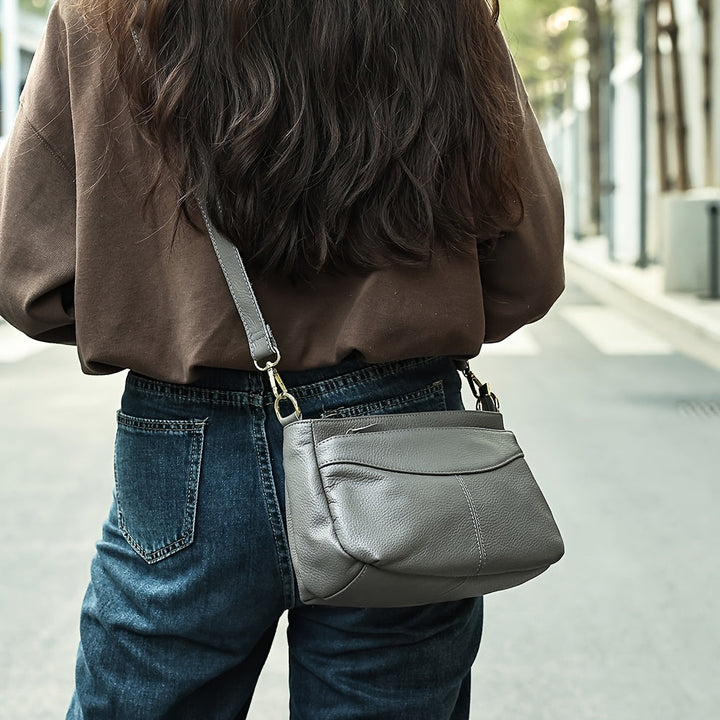 Rina – Bolso bandolera elegante con diseño de guijarros
