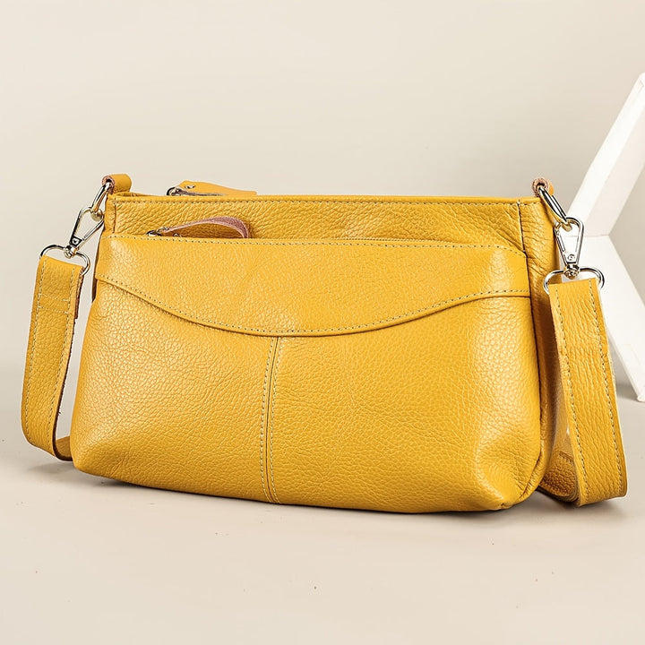Rina – Bolso bandolera elegante con diseño de guijarros