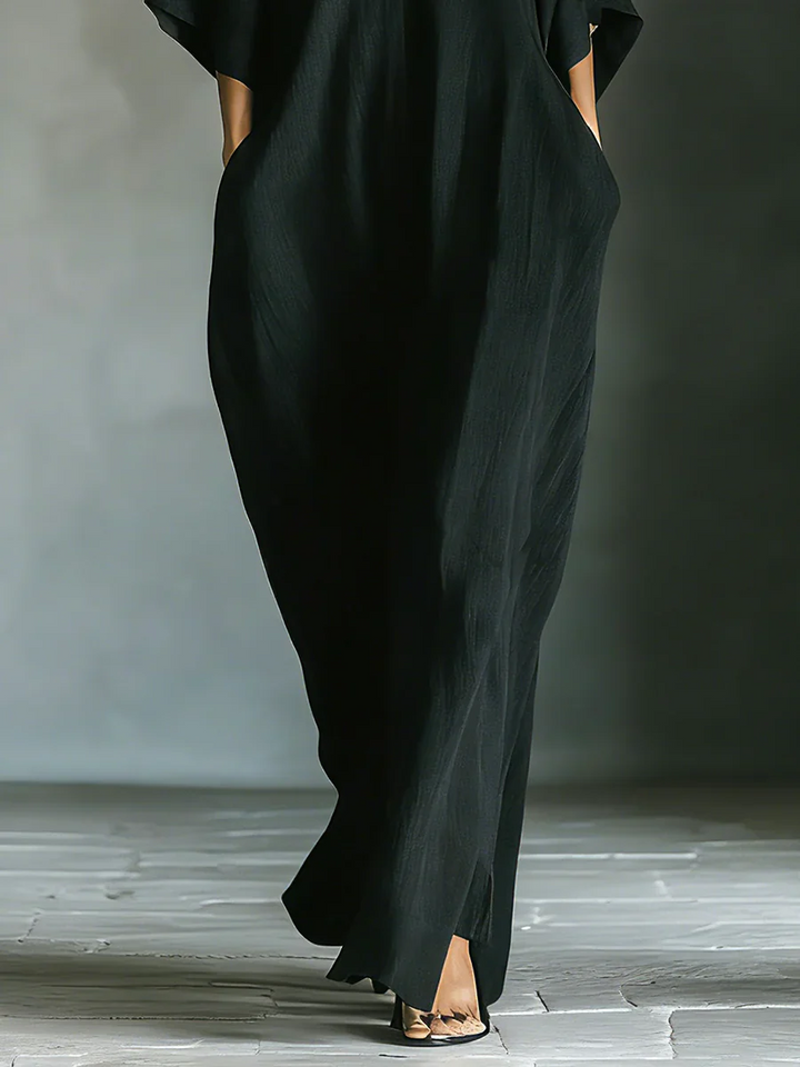 Alejandra – Vestido largo negro oversize elegante con mangas kimono