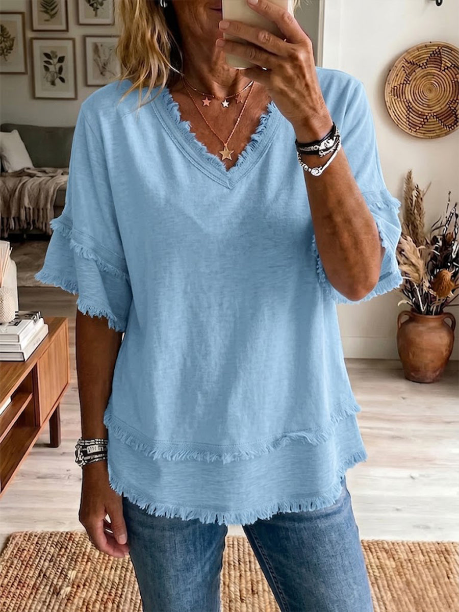 Isabella – Top elegante con mangas cortas y dobladillo sin acabado