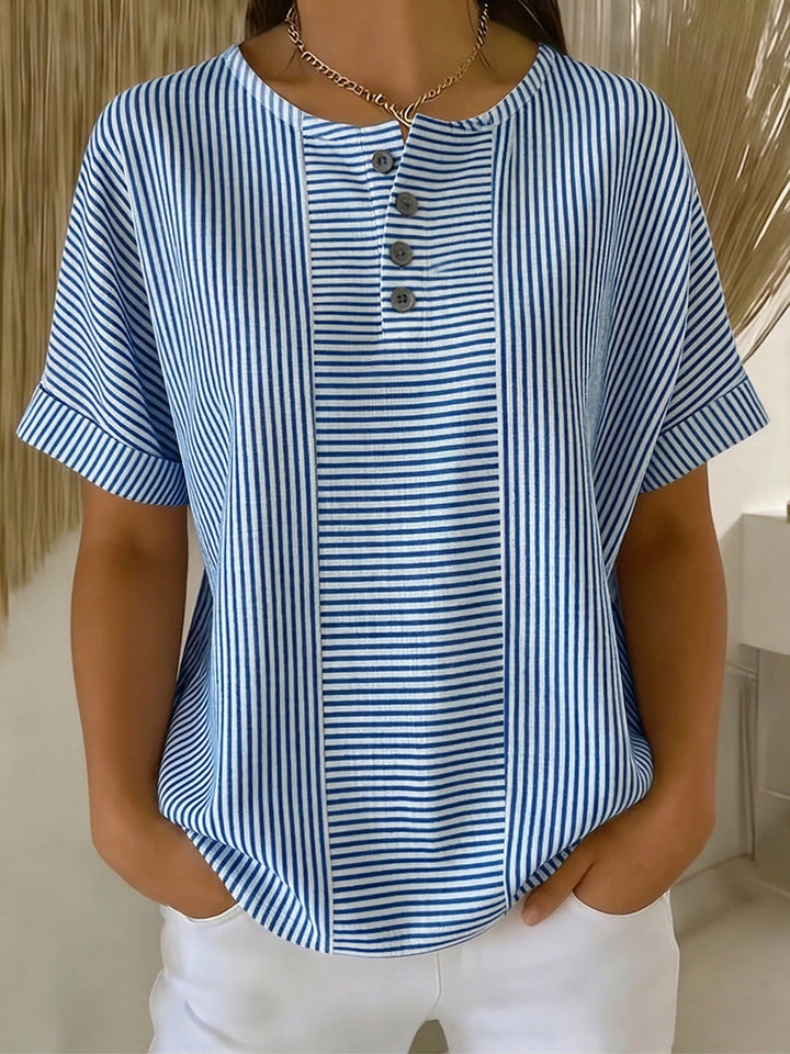 Lucía – Blusa a rayas con corte elegante