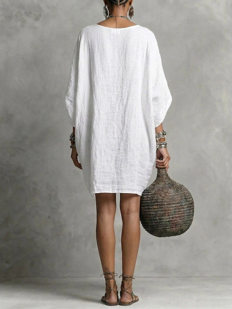 Teresa – Vestido corto fluido elegante con cuello caído y manga amplia