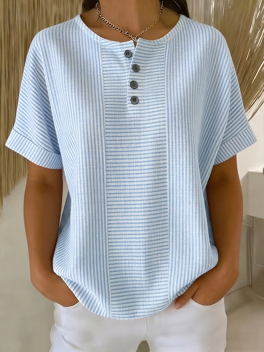Lucía – Blusa a rayas con corte elegante
