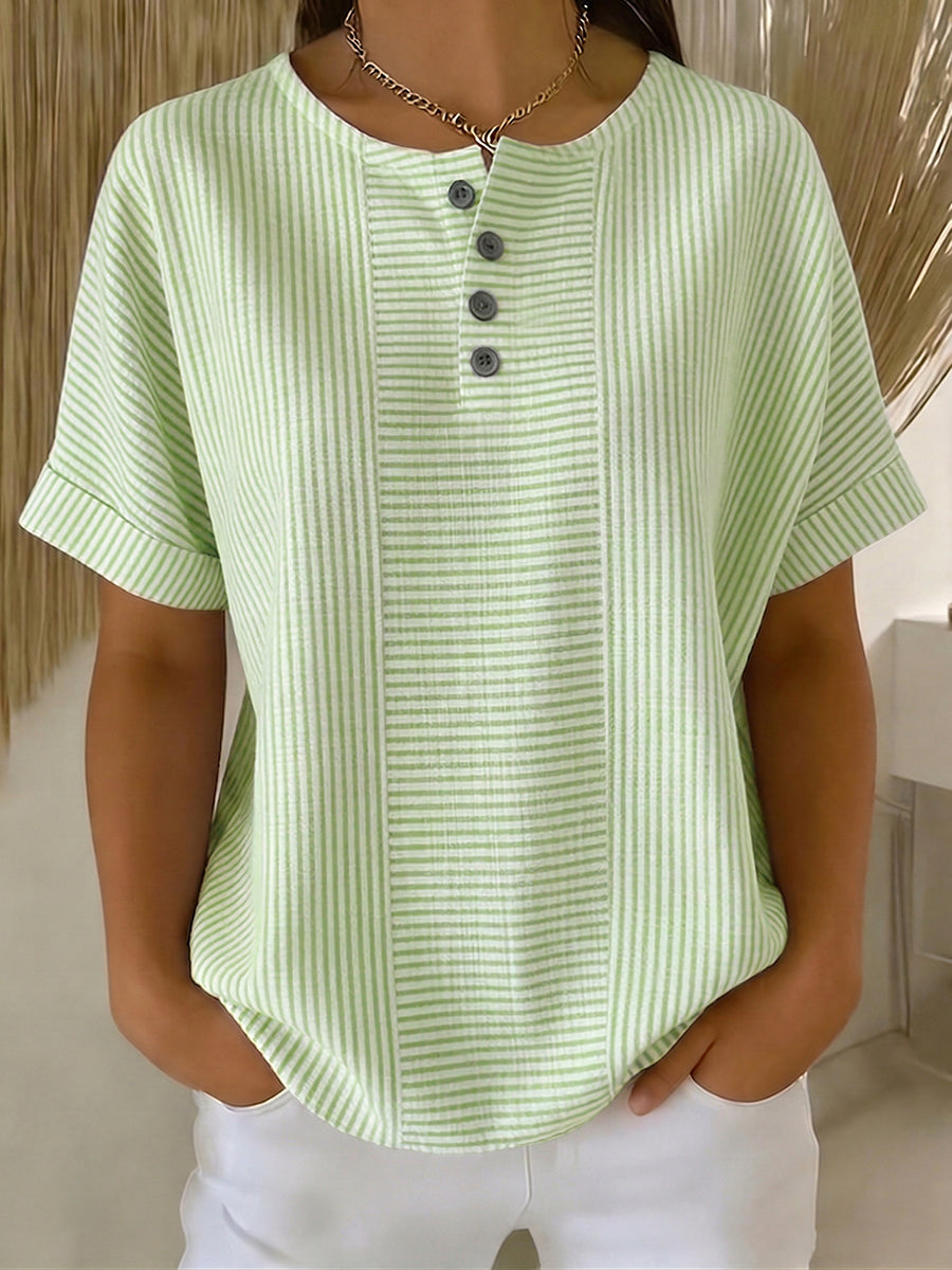 Lucía – Blusa a rayas con corte elegante