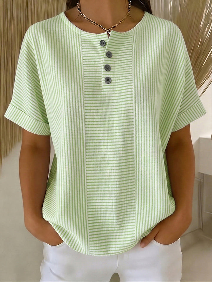 Lucía – Blusa a rayas con corte elegante