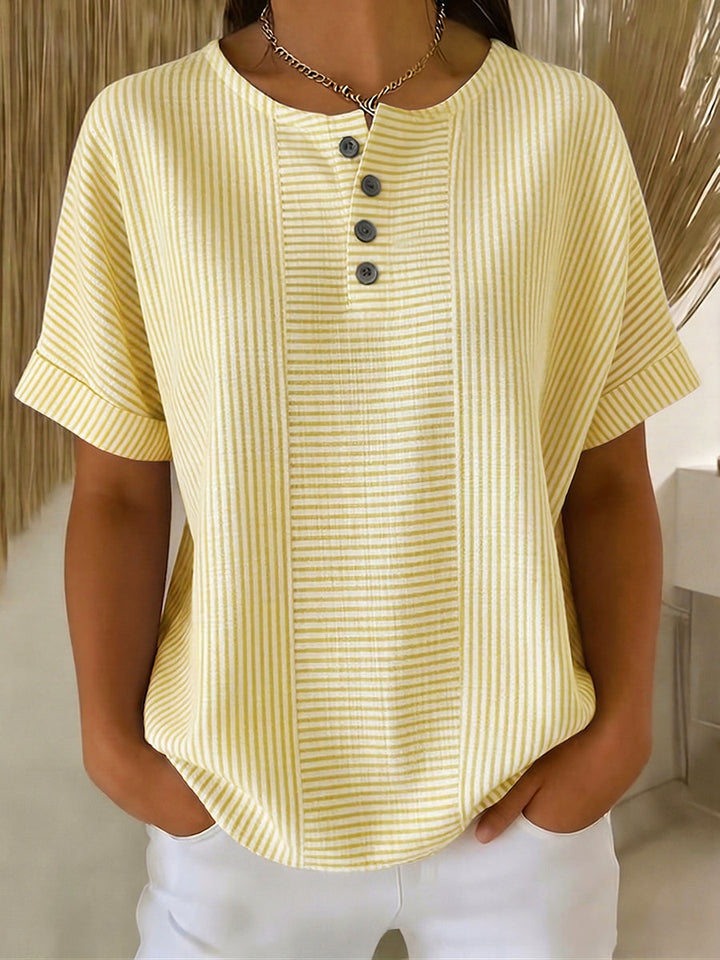 Lucía – Blusa a rayas con corte elegante