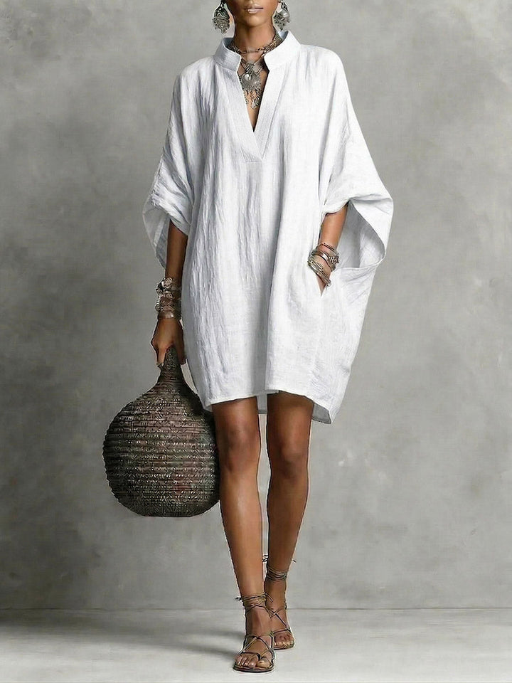 Inés – Vestido corto elegante con escote en V y manga amplia